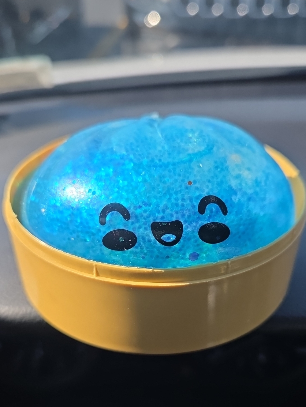 Cute Blue Smiley Squishy in Yellow Tin
